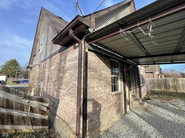 6215 E 11th St, Indianapolis, IN 46219 - view of side of property with brick siding