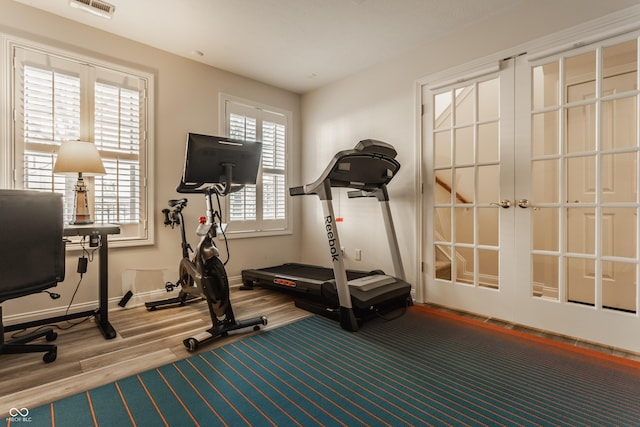 workout area featuring wood-type flooring