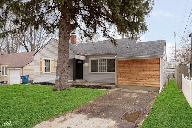 ranch-style house with a front lawn