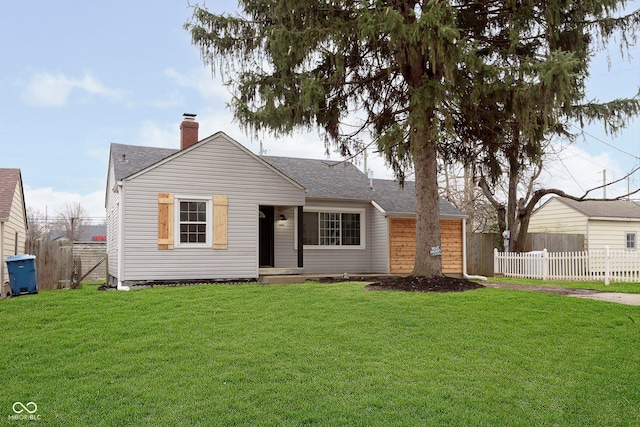 single story home with a front lawn