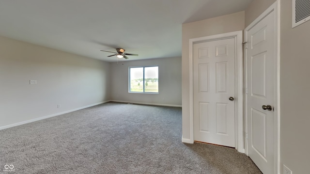 unfurnished bedroom with carpet floors and ceiling fan