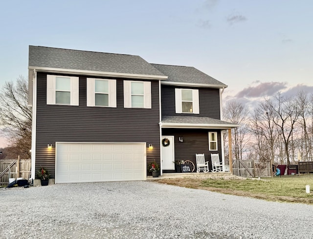 view of front of property featuring a garage