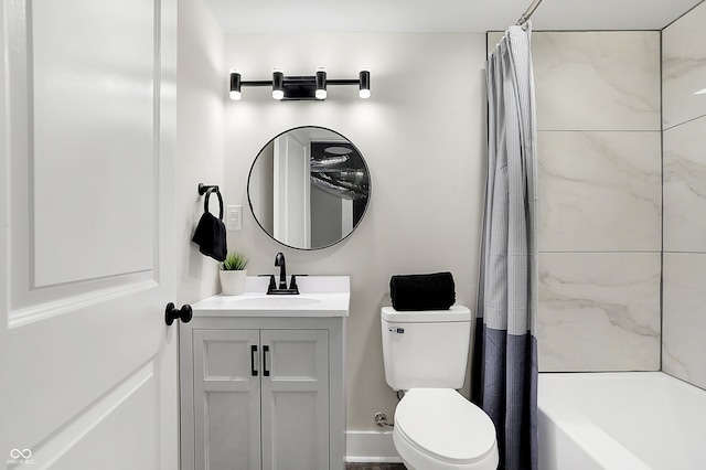 full bathroom featuring vanity, toilet, and shower / tub combo with curtain