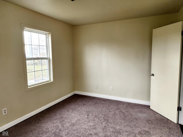 spare room featuring carpet flooring