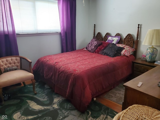 bedroom featuring hardwood / wood-style floors