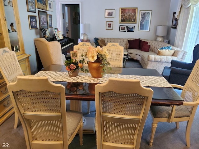 view of carpeted dining area