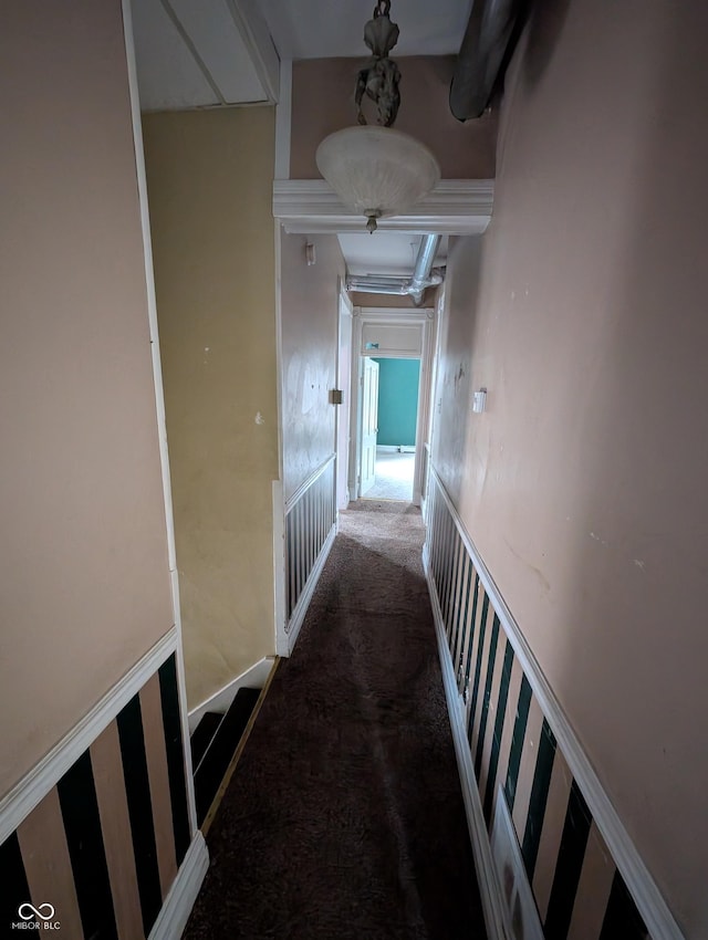 corridor with dark carpet