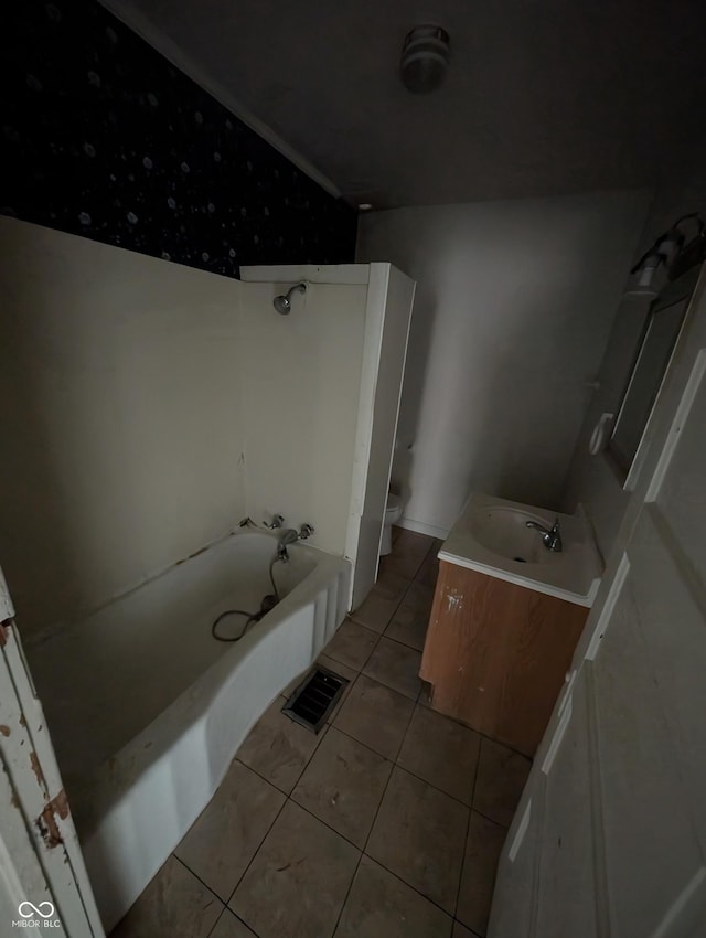 full bathroom featuring tile patterned flooring, shower / tub combination, vanity, and toilet