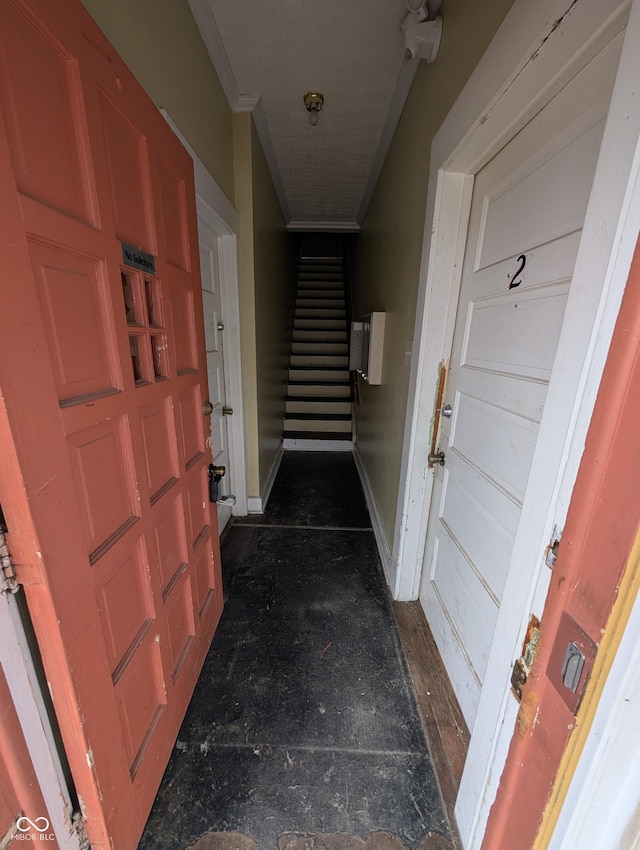 corridor featuring ornamental molding