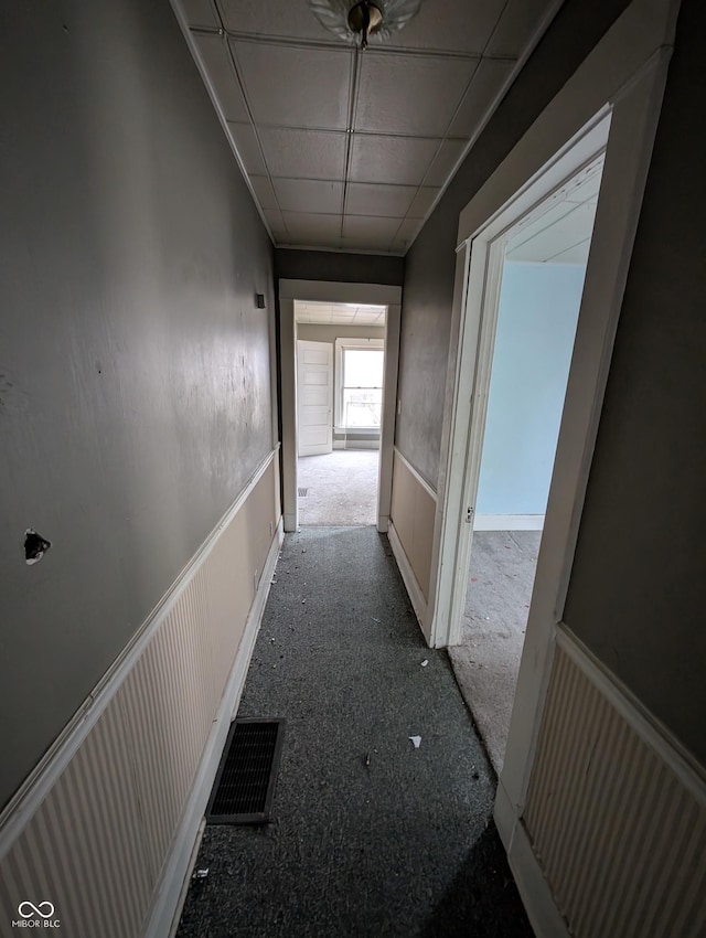 hallway with carpet