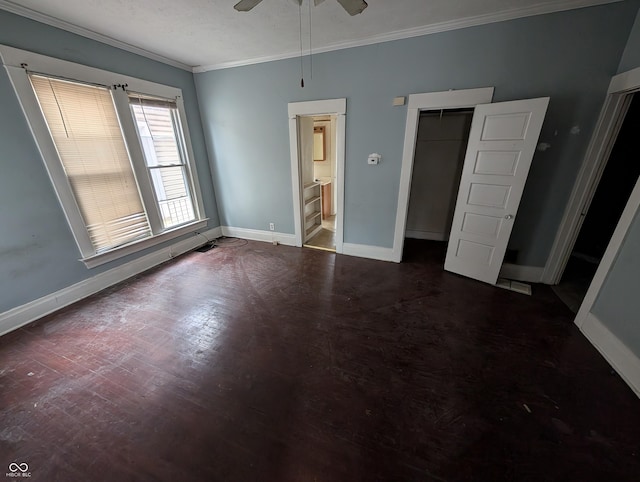 unfurnished bedroom featuring a closet, ceiling fan, and crown molding