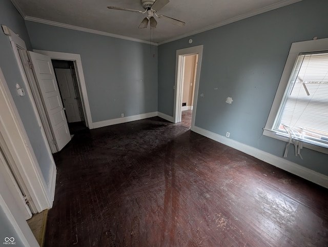 unfurnished bedroom with ceiling fan, crown molding, and dark hardwood / wood-style floors