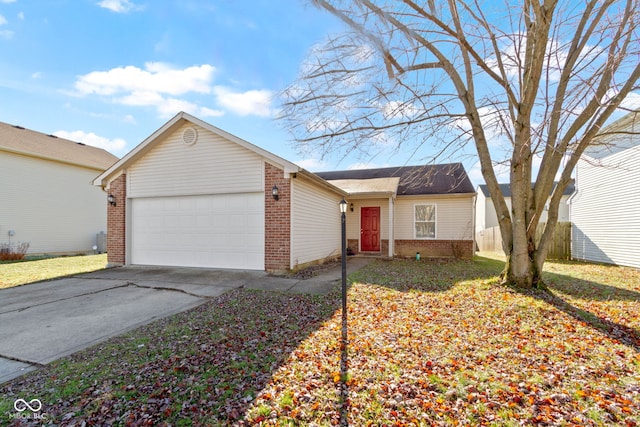 single story home with a garage