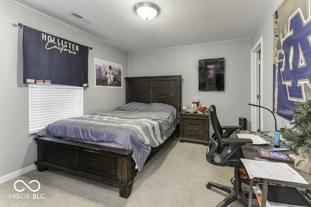 bedroom with light carpet