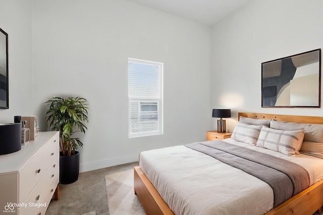 2218 N Arsenal Ave, Indianapolis, IN 46218 - bedroom with light colored carpet and baseboards