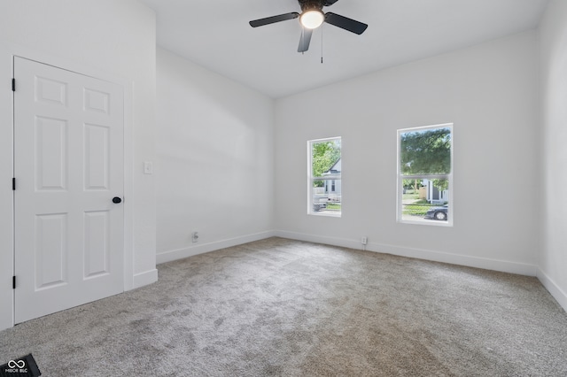 2218 N Arsenal Ave, Indianapolis, IN 46218 - carpeted empty room with ceiling fan and baseboards