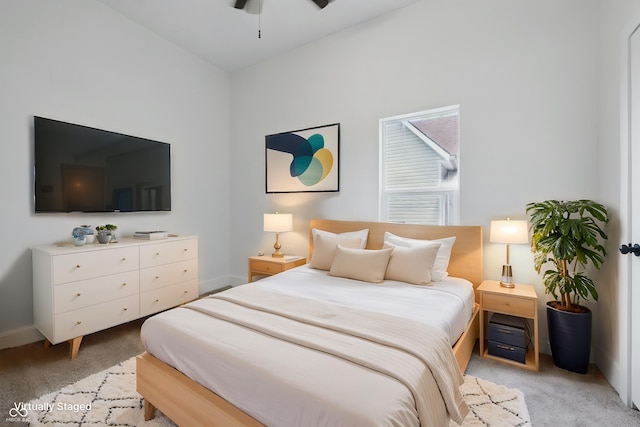 2218 N Arsenal Ave, Indianapolis, IN 46218 - bedroom with light carpet and ceiling fan