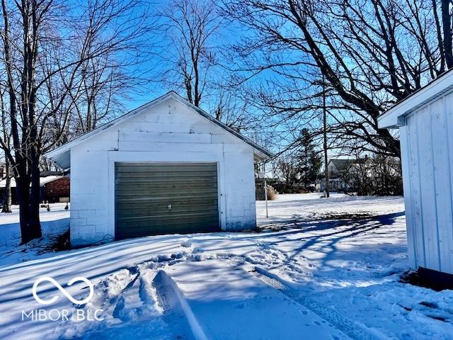 view of snow covered garage