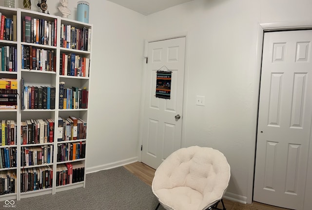 living area with wood-type flooring