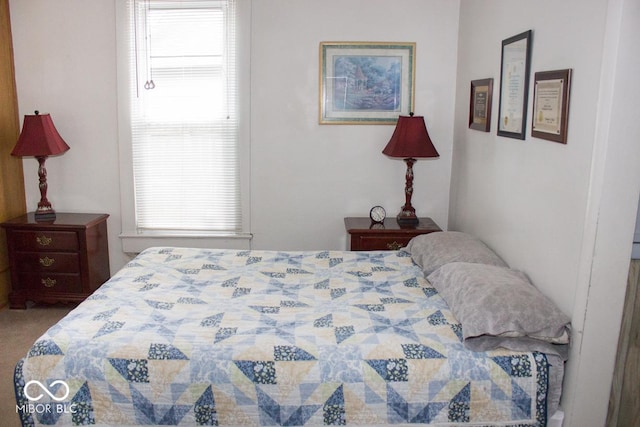 bedroom featuring carpet