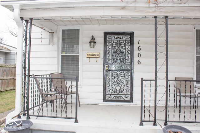 doorway to property with a porch