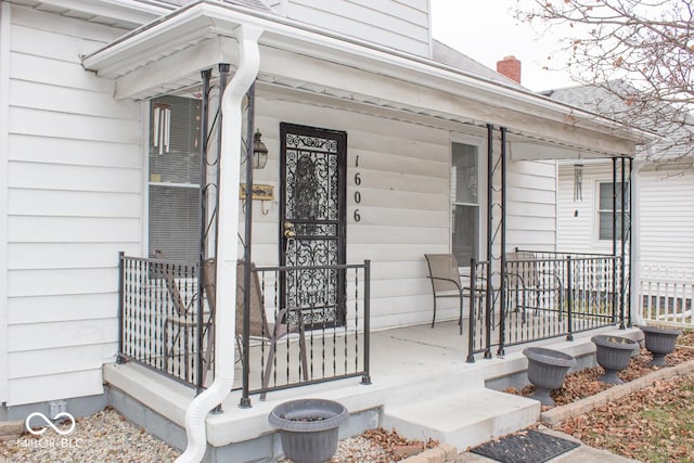 doorway to property with covered porch