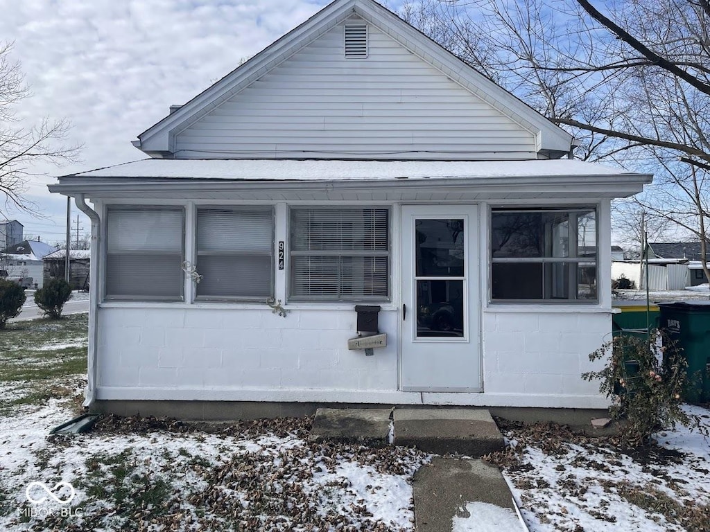 view of snow covered property