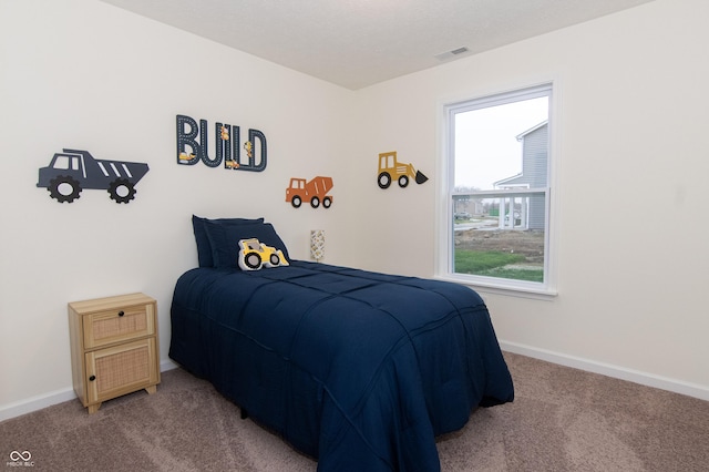 bedroom featuring carpet