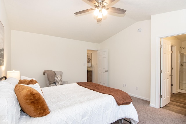 bedroom featuring ceiling fan, light carpet, and vaulted ceiling