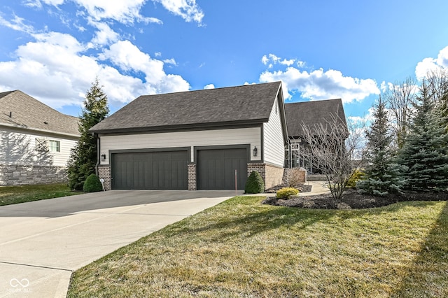 view of property exterior with an attached garage, a yard, driveway, and brick siding