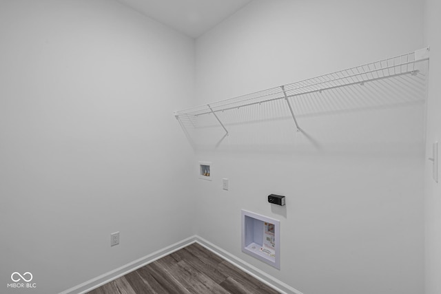 clothes washing area featuring dark wood-type flooring, electric dryer hookup, and hookup for a washing machine