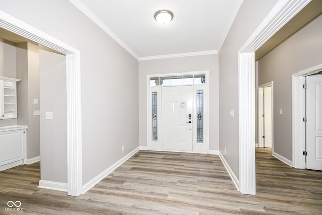 entryway featuring crown molding and hardwood / wood-style flooring