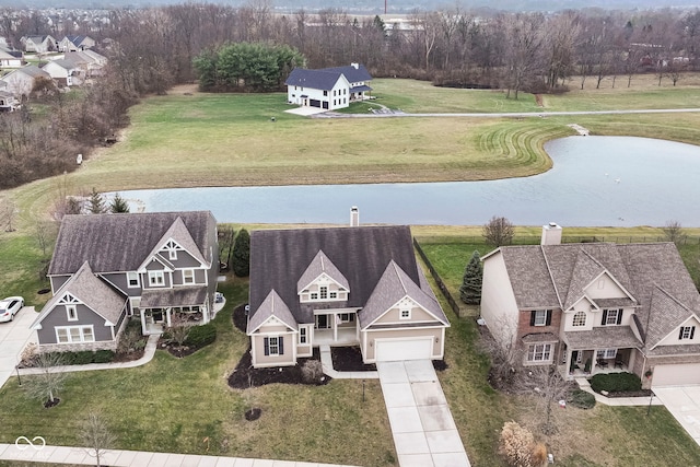 bird's eye view with a water view