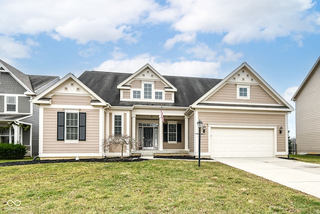 craftsman house featuring a porch, a garage, and a front lawn