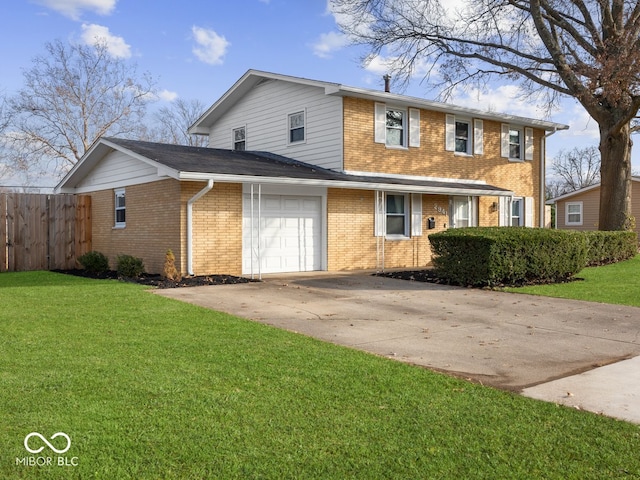 view of front facade featuring a garage and a front yard