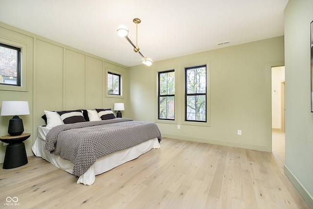 bedroom featuring light wood-type flooring