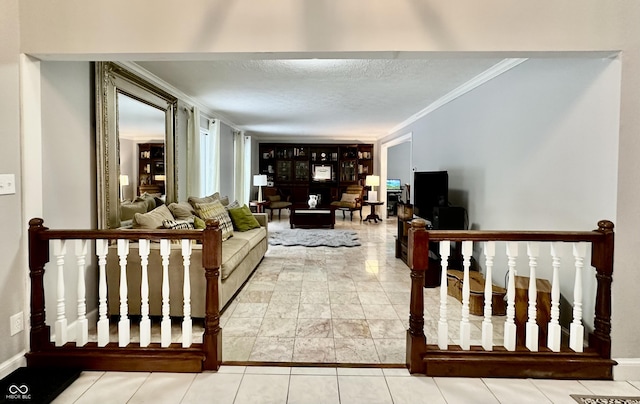 tiled living room featuring a textured ceiling and crown molding