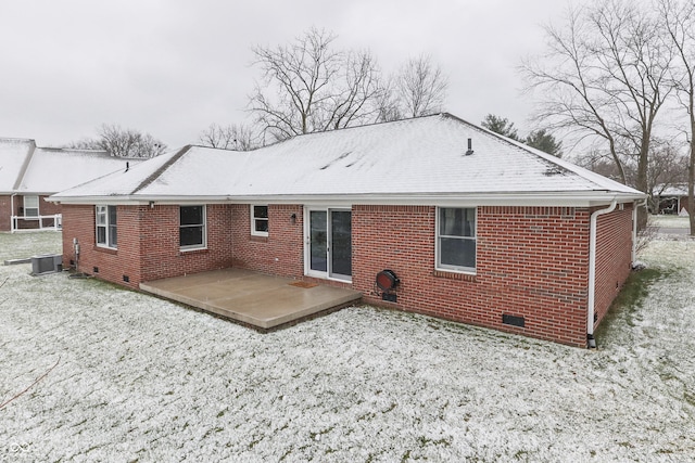 rear view of property featuring a patio area and cooling unit