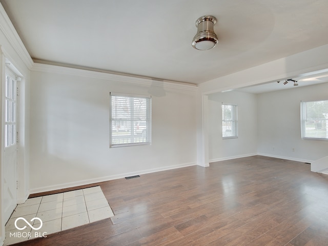 unfurnished room featuring light hardwood / wood-style floors