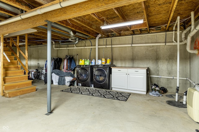 basement with washer and clothes dryer