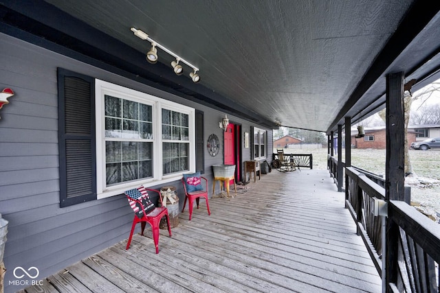 wooden deck with a porch