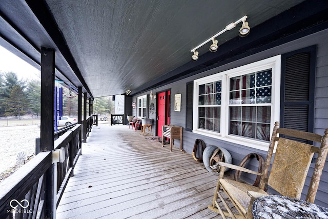 deck with covered porch