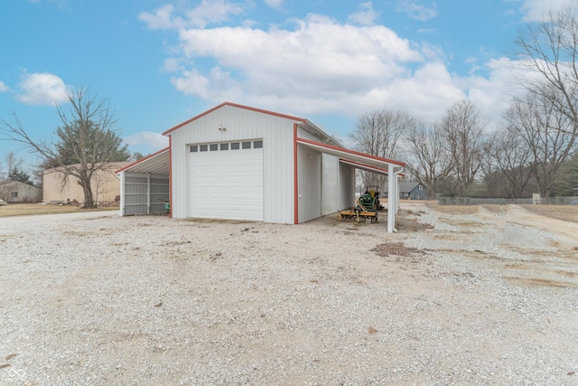 garage with a carport