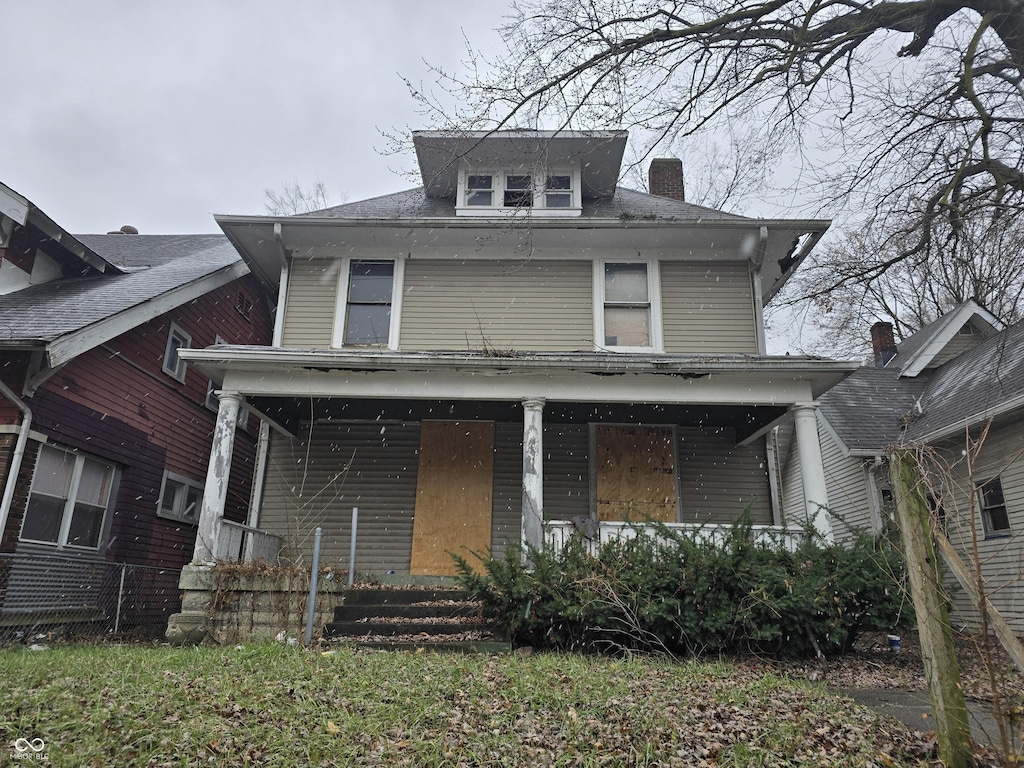 view of front facade featuring covered porch