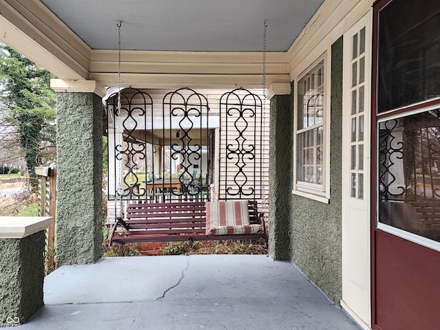 exterior space featuring covered porch