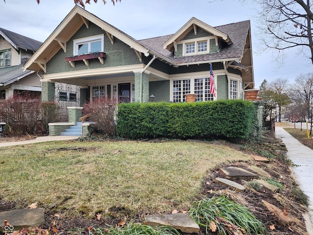 view of front of house with a front lawn