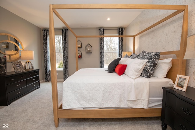 bedroom with light colored carpet