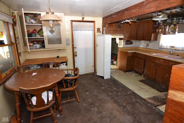 kitchen with tasteful backsplash and sink