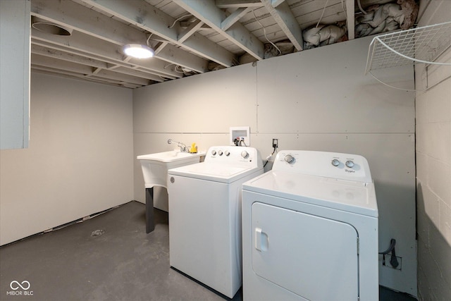 laundry area featuring washing machine and dryer