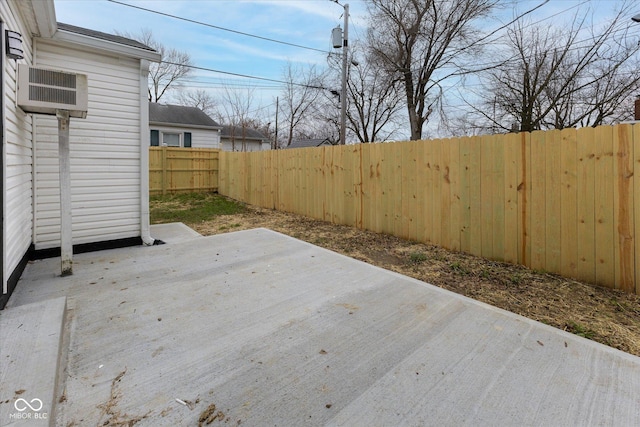 wooden deck with a patio area